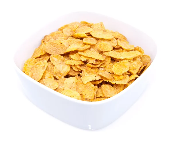 Stock image Heap of cornflakes isolated on white