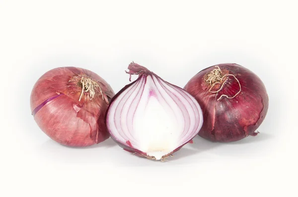 A bunch of red onions or shallots that are still fresh after being  harvested. 10972013 Stock Photo at Vecteezy