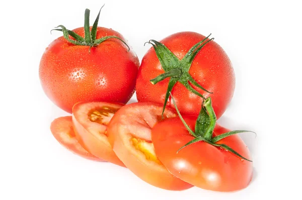 Wasser benetzte Tomaten — Stockfoto