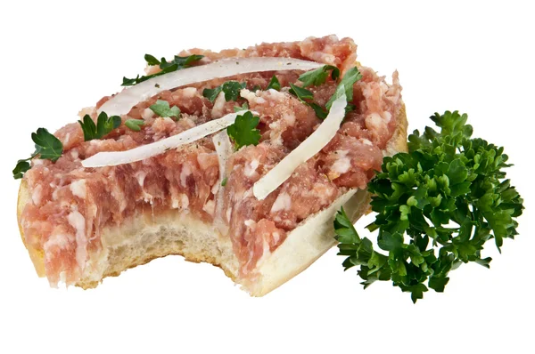 Bitten off halved roll with minced pork — Stock Photo, Image
