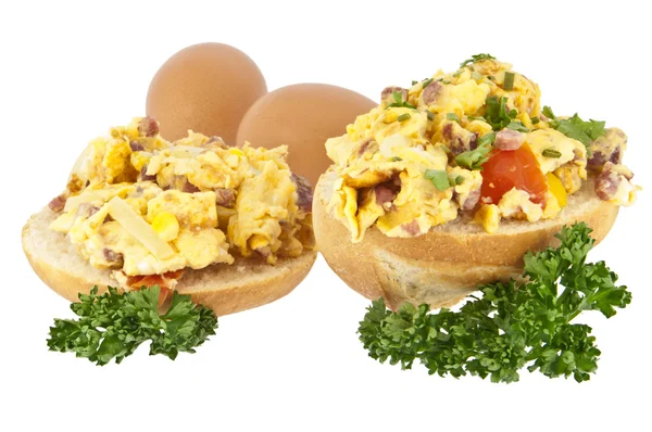 stock image Halved roll with scrambled eggs (with clipping path)