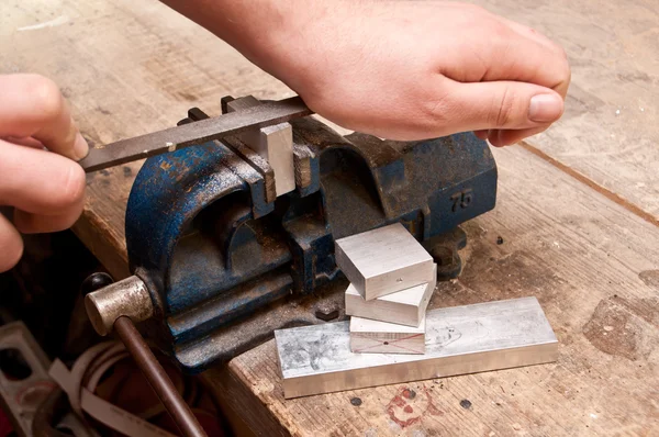 Grinding a block of metal — Stock Photo, Image