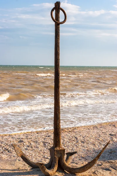 stock image Rusted anchor on the beach