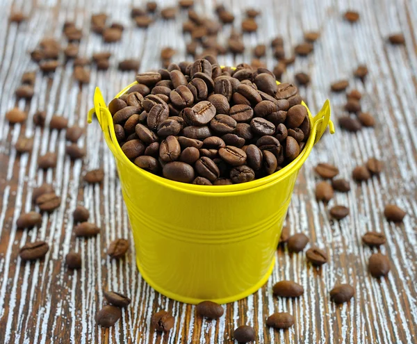 Coffee beans in a small bucket — Stock Photo, Image