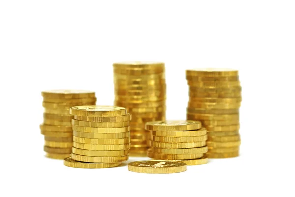 Piles of golden coins (isolated) — Stock Photo, Image
