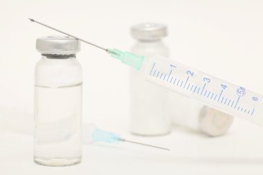 Medical still-life with syringe clipart