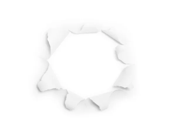 The sheet of torn paper with round hole (isolated) — Stock Photo, Image