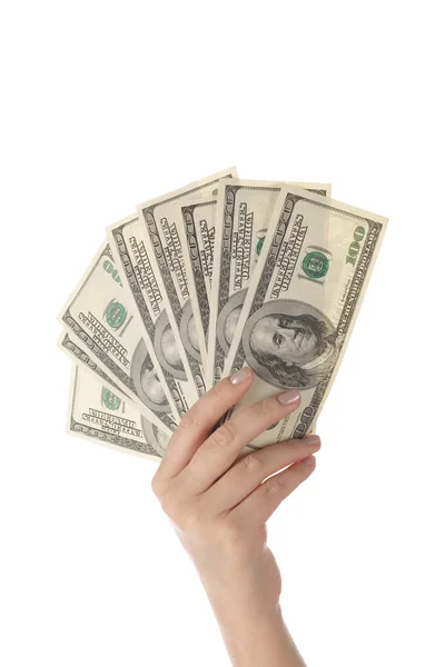 Pilha de notas de dólar na mão feminina sobre fundo branco — Fotografia de Stock