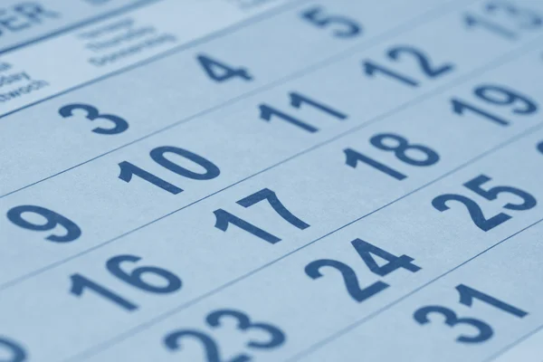 stock image Close up of calendar (blue toned)