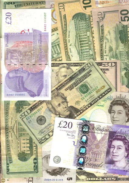 Bunch of U.S. dollars and British pounds — Stock Photo, Image