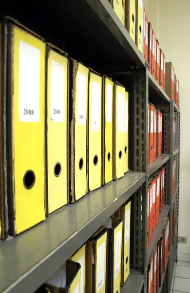 stock image Coloured file folders in office cabinet