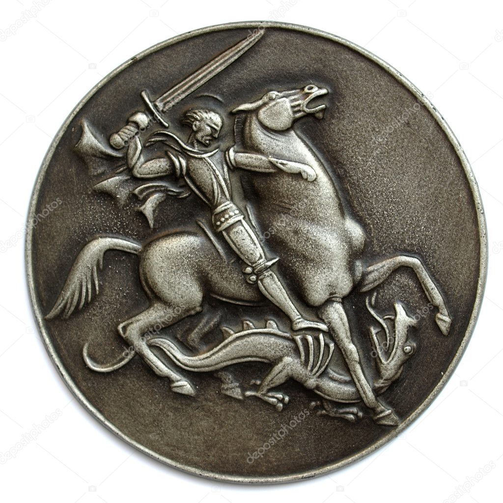 Metal medal depicting St George as a horse rider fighting a drak