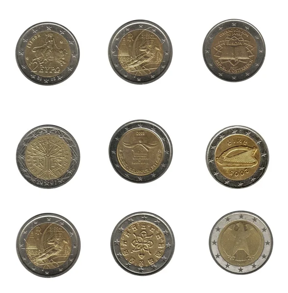 Девять монет в два евро из разных стран — стоковое фото