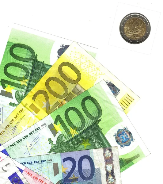 Detalhe notas de euro, e moeda italiana — Fotografia de Stock