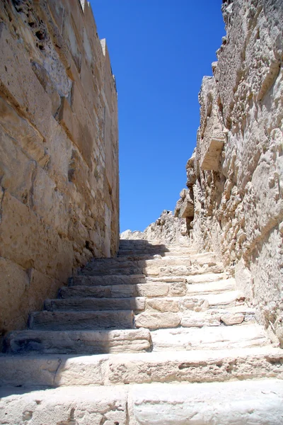 stock image A stone stairway up against the blue sky