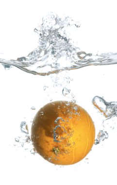 Fresh Orange Splashing in Water