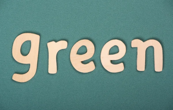 Groen in houten brieven — Stockfoto
