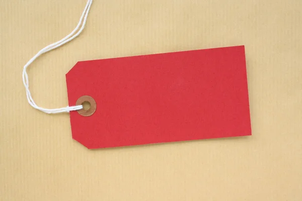 Étiquette à bagages en papier rouge — Photo