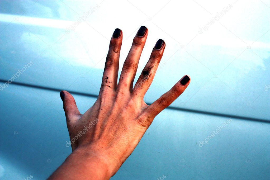 Dirty hand on a blue background