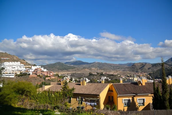 stock image Houses overlooking the mountains