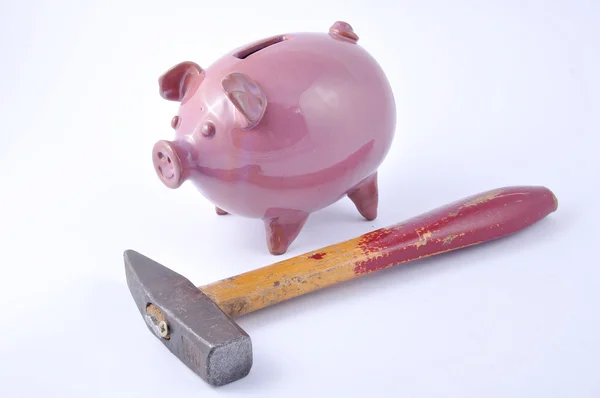 stock image Piggy bank inserting coins