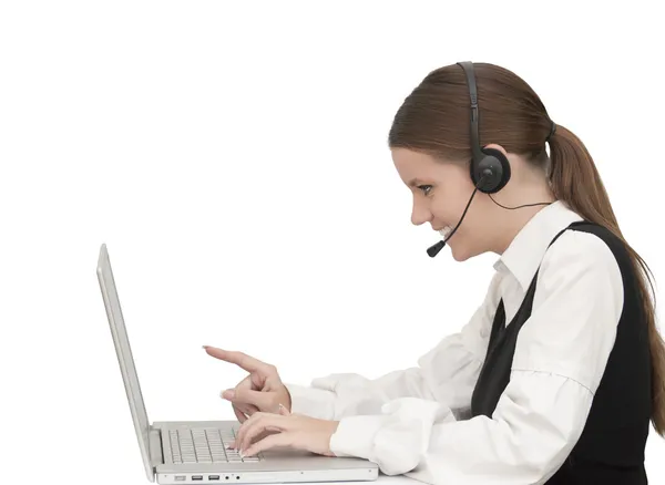 Telefon operatora w słuchawki z laptopa — Zdjęcie stockowe