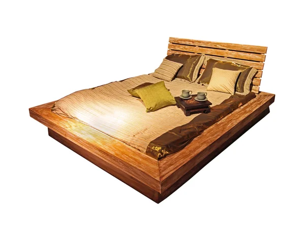Drewniane łóżko na białym tle — Zdjęcie stockowe