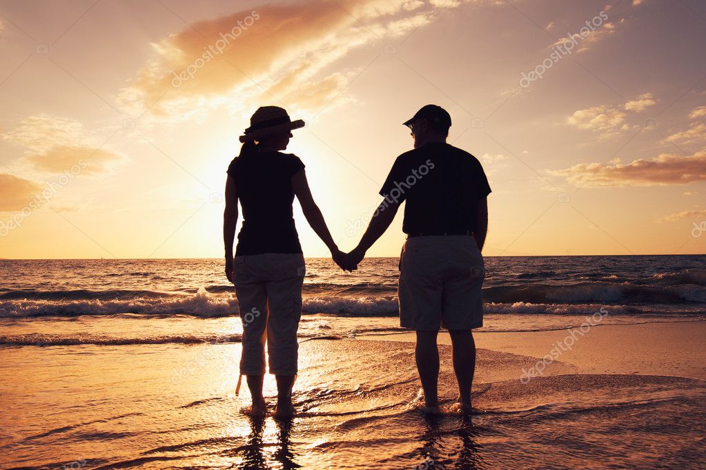 Senior Couple Enjoying Sunset at the Beach — Stock Photo ...