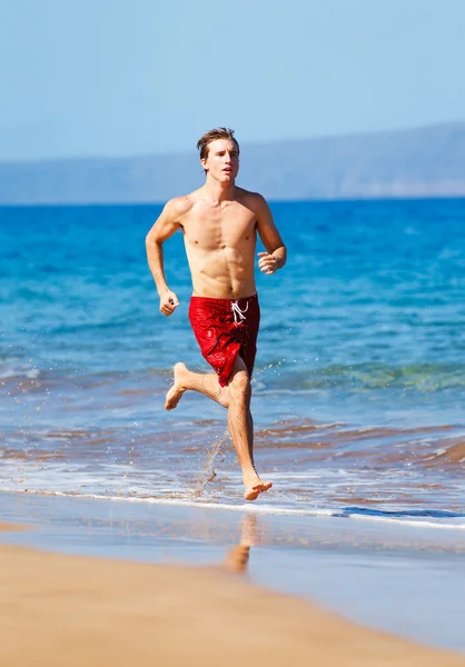 Biegacz na plaży — Zdjęcie stockowe