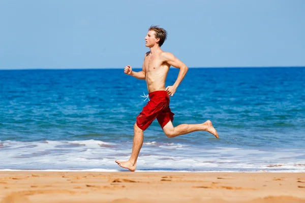 Läufer am Strand — Stockfoto