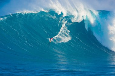 MAUI, HI - MARCH 13: Professional surfer Francisco Porcella ride clipart