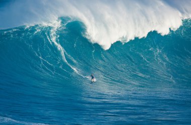 MAUI, HI - MARCH 13: Professional surfer Marcio Freire rides a g clipart