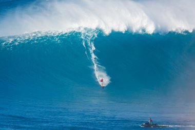 MAUI, HI - MARCH 13: Professional surfer Francisco Porcella ride clipart