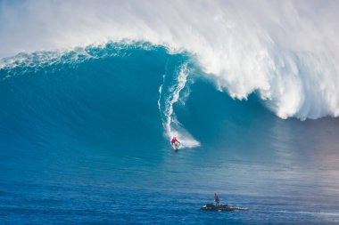 MAUI, HI - MARCH 13: Professional surfer Francisco Porcella ride clipart