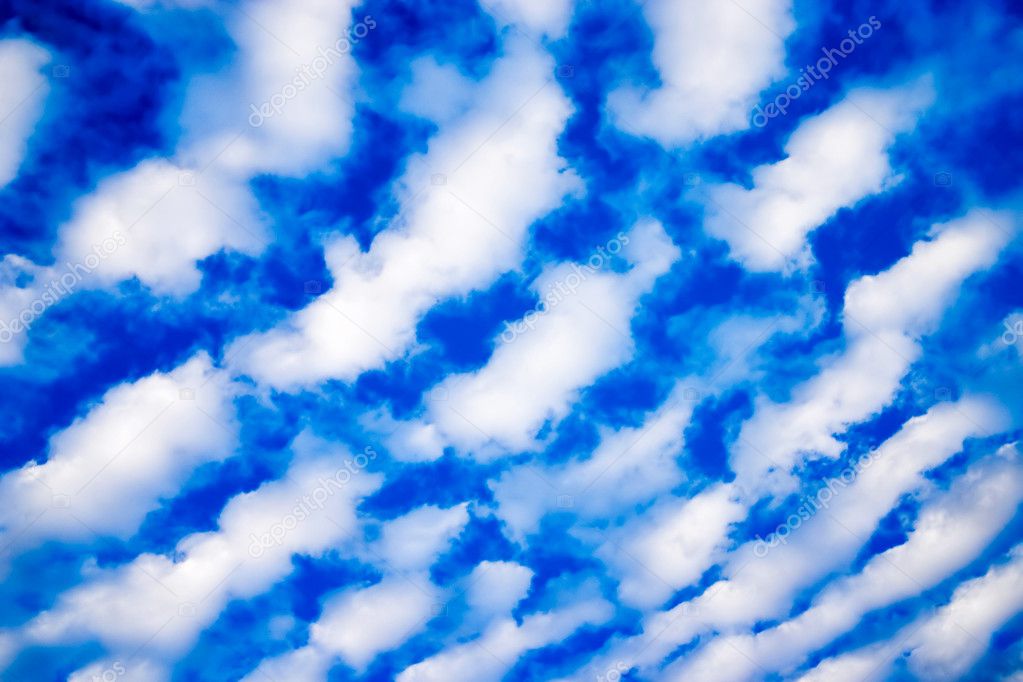 White Cumulus Clouds and a Blue Sky