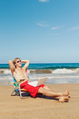 Business man at the beach clipart