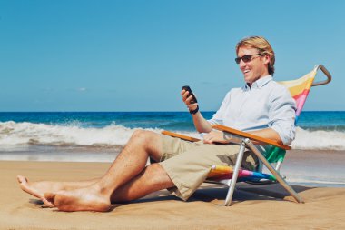 Business Man on the Beach in Hawaii clipart