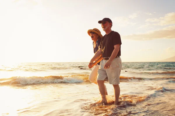 Senior Couple Enjoying Sunset at the Beach — Stock Photo, Image