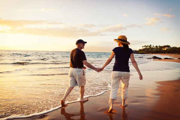 Senior Couple Enjoying Sunset at the Beach — Stock Photo, Image