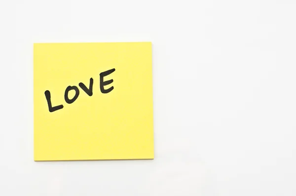 stock image Yellow square Post it with Love written on it