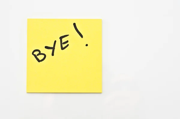 Yellow square Post it with Bye written on it — Stock Photo, Image