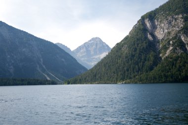 The lake in Alps clipart