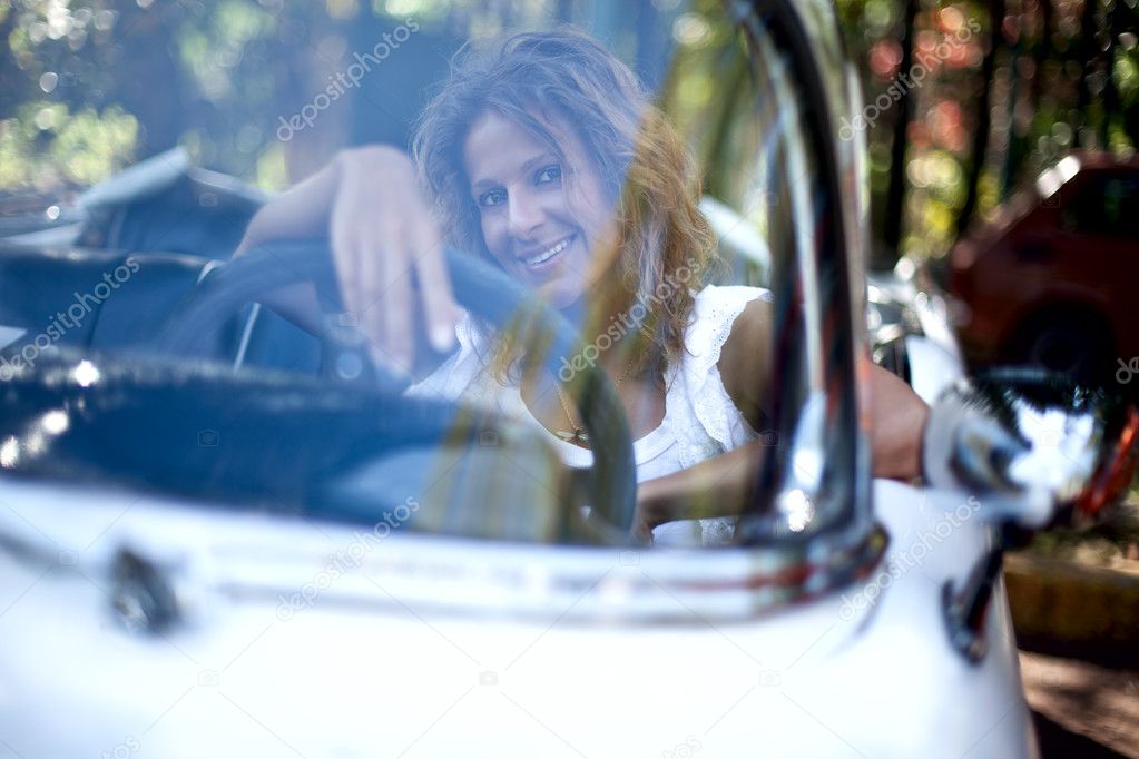Girl in a white car