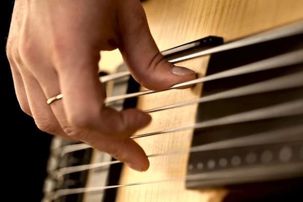 Hands on guitar — Stock Photo, Image