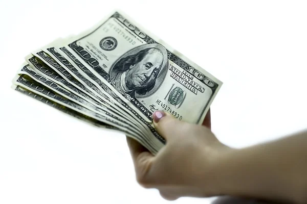 Dollar in hand — Stockfoto
