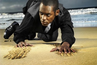 Young amn on beach crawling clipart