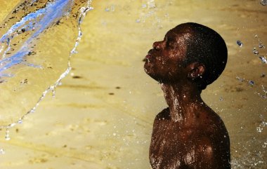 African boy and water clipart