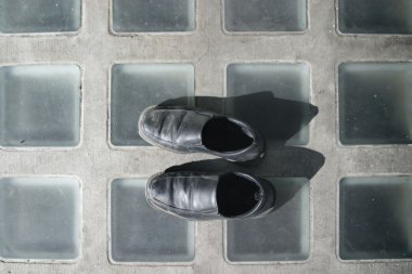 Shoes on pavement clipart