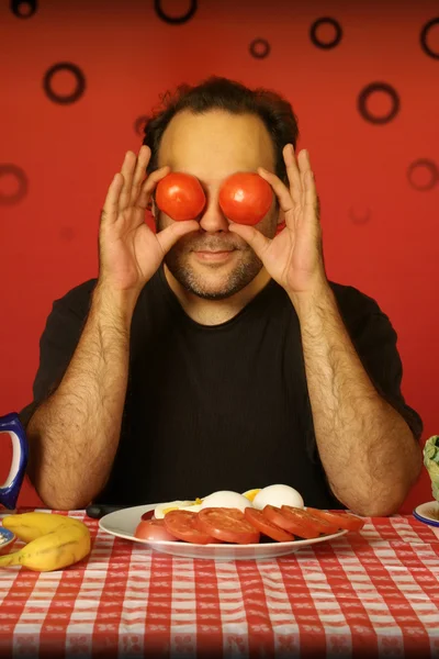 Άνθρωπος με ντομάτες — Φωτογραφία Αρχείου