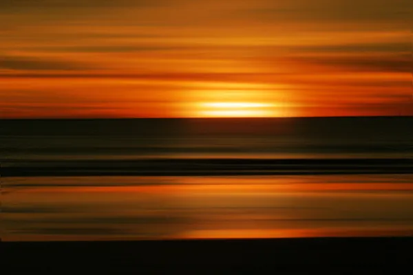 Αφηρημένη ηλιοβασίλεμα στην παραλία — Φωτογραφία Αρχείου